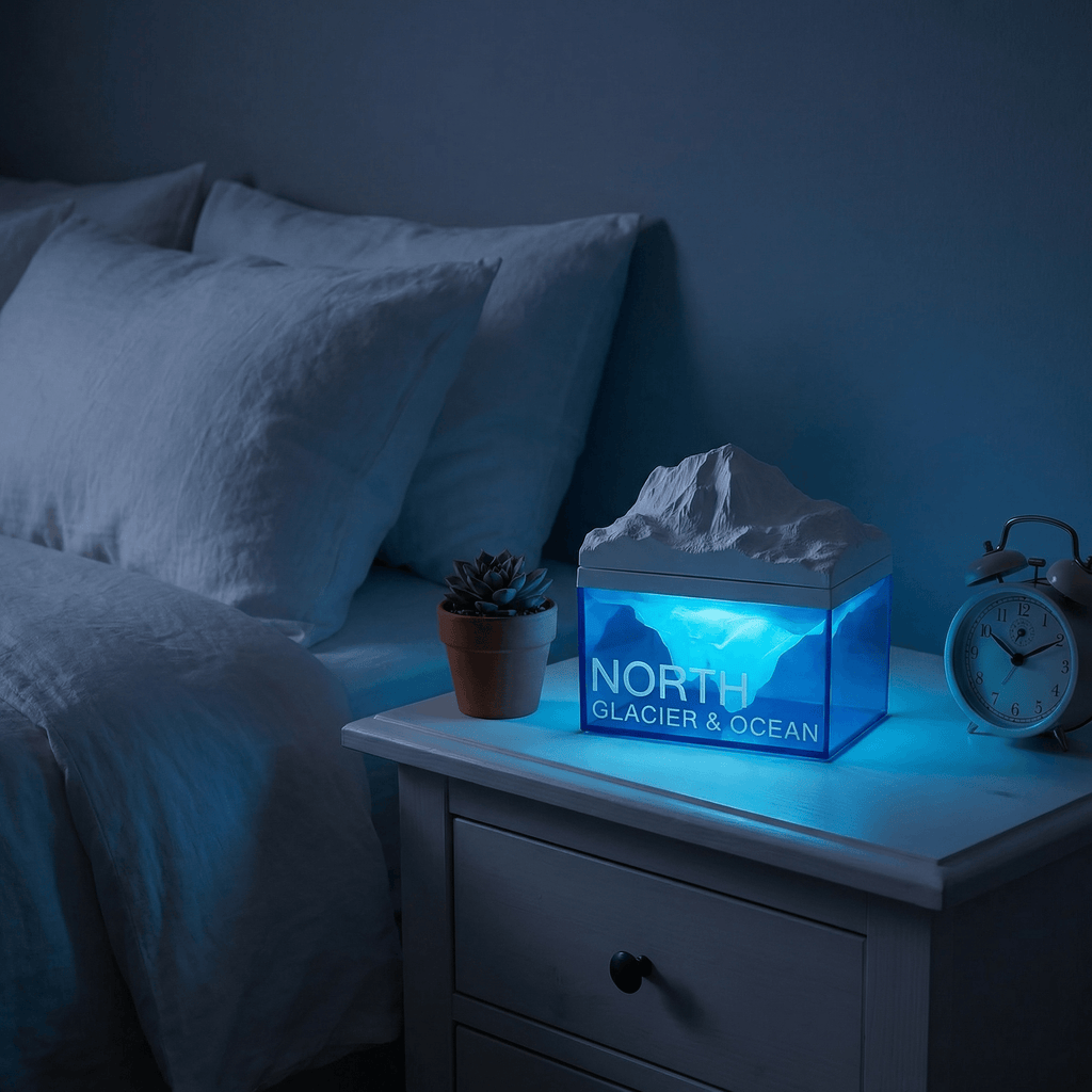 Tissue box with ocean design on a nightstand next to a bed